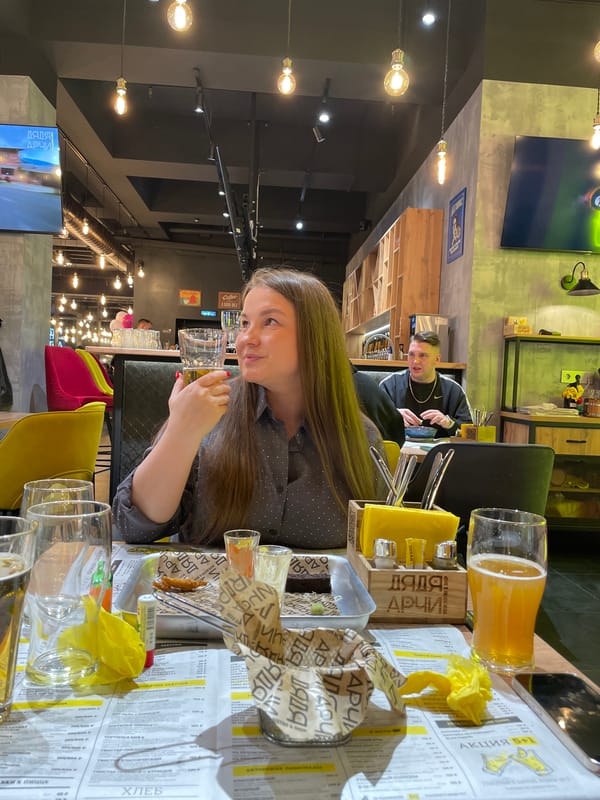 Two women dine together at Izhevsk restaurant