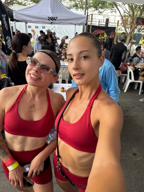 Women in red athletic wear take selfie in Thailand
