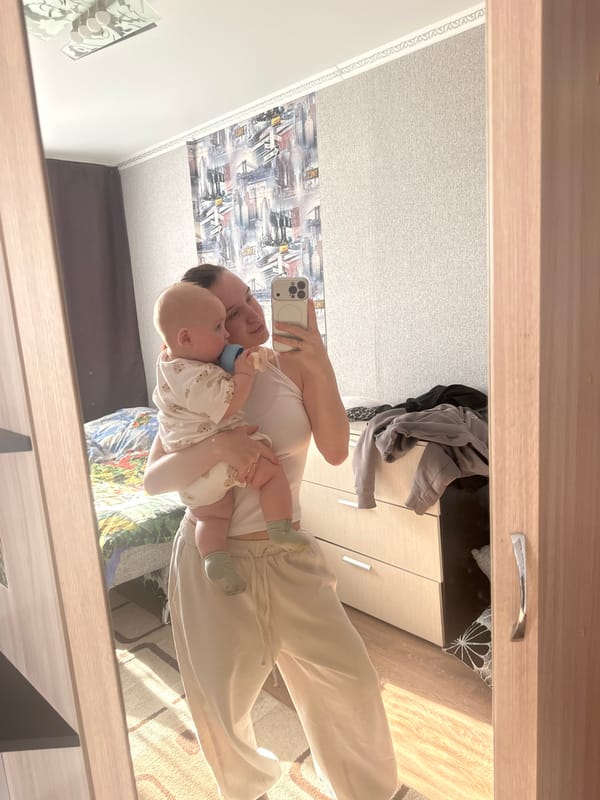Mother and baby mirror selfies captured in Kemul home