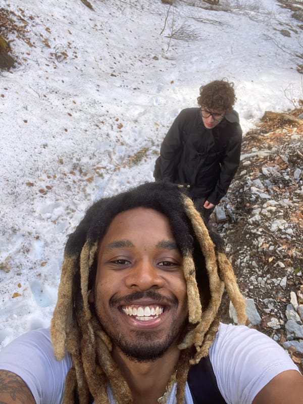 Hikers photograph snowy mountain trek near Saint-Michel-les-Portes