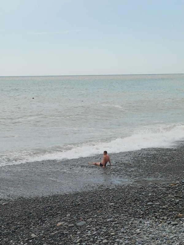 Quiet afternoon at the pebble beach on Sochi's coastline