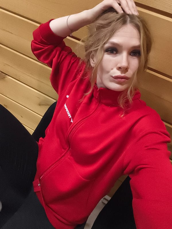 Woman takes selfies with cat in Russian home