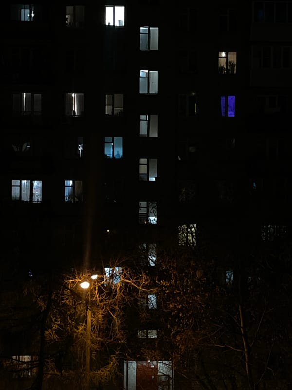 Evening observations of illuminated high-rise buildings in urban area