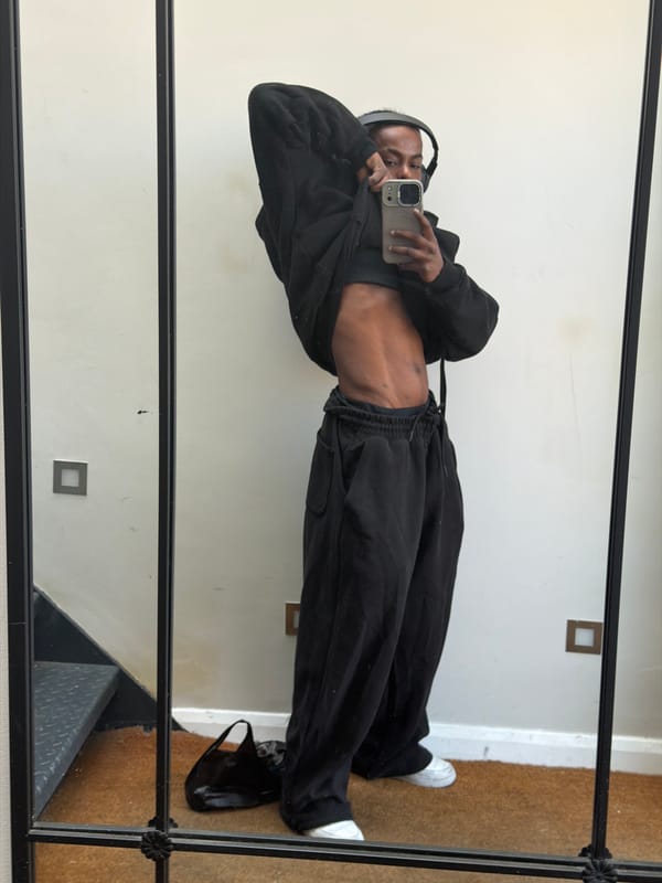 Person takes mirror selfie in London indoor location