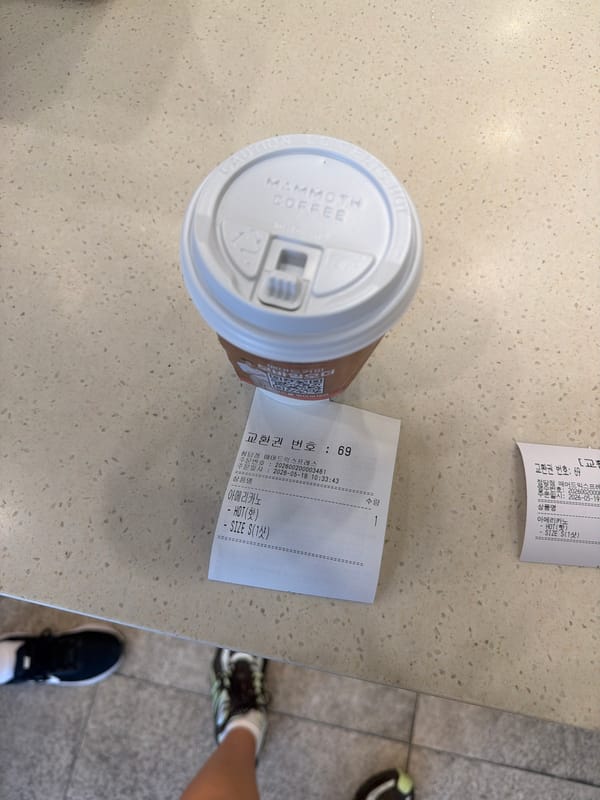 Late-night coffee purchase documented at Seoul Mammoth Coffee location