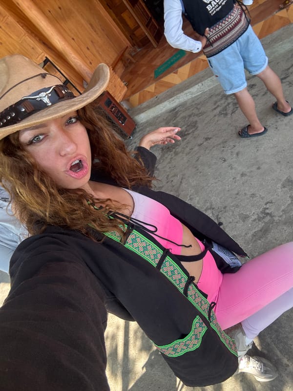 Tourist horseback riding in cowboy hat captured in Bắc Hà