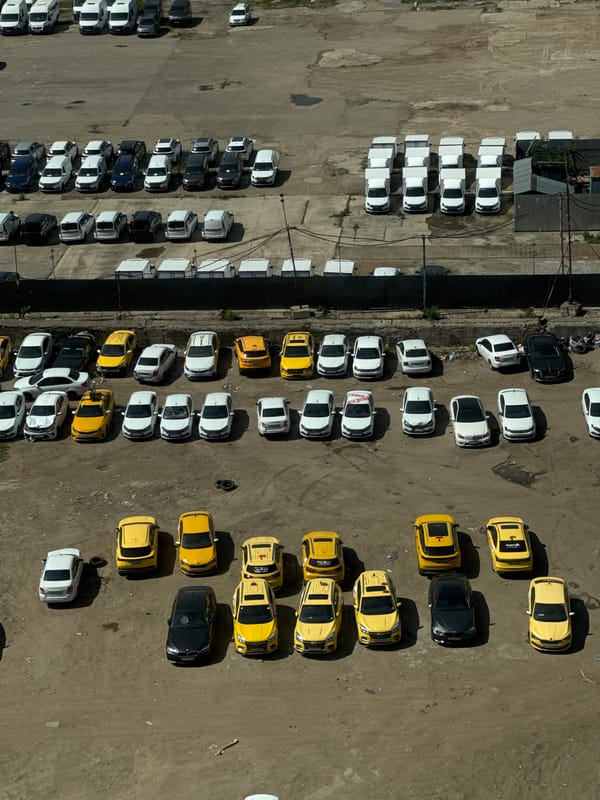 Aerial view captures busy parking lot, tall buildings in Ukromne