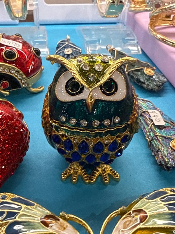 Tourist browses souvenir shop displays in Puerto Del Carmen