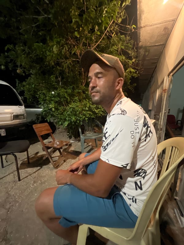 Late-night outdoor hangout under the moon in Conuco Viejo