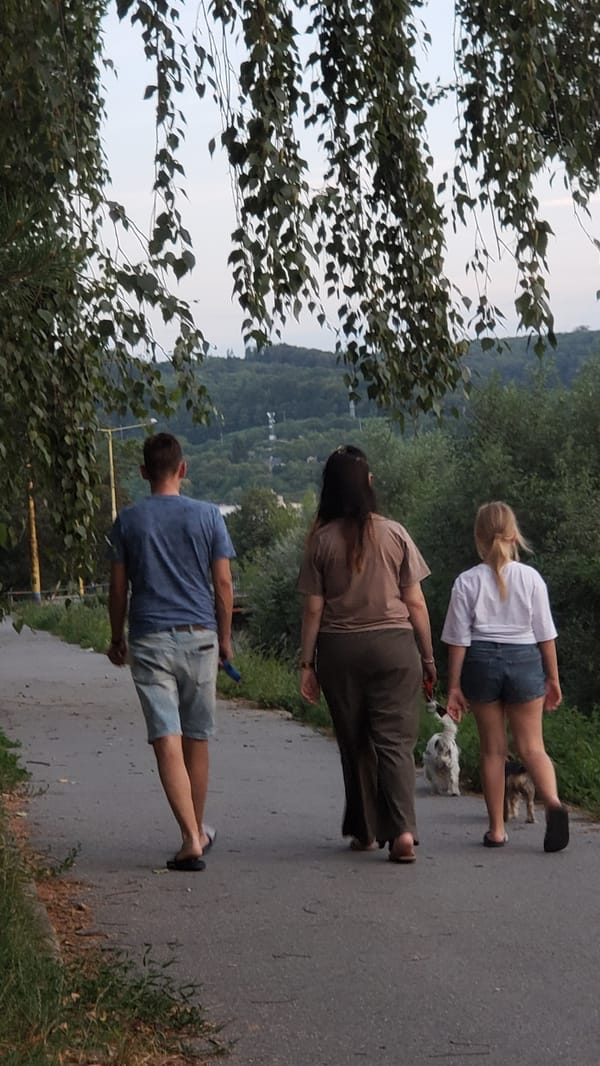 Summer evening stroll along Prešov's Sekčov River at sunset