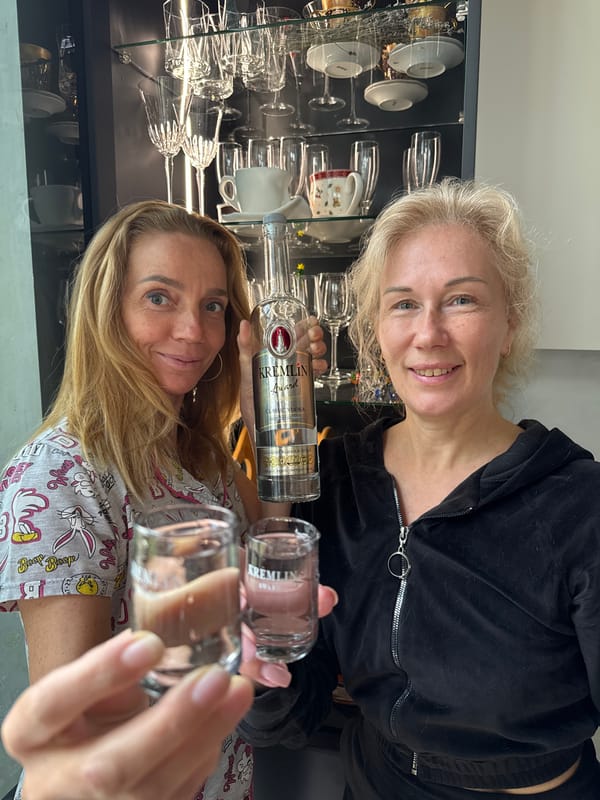 Women pose with Russian vodka during morning #FamilyTime in Steklyannyi