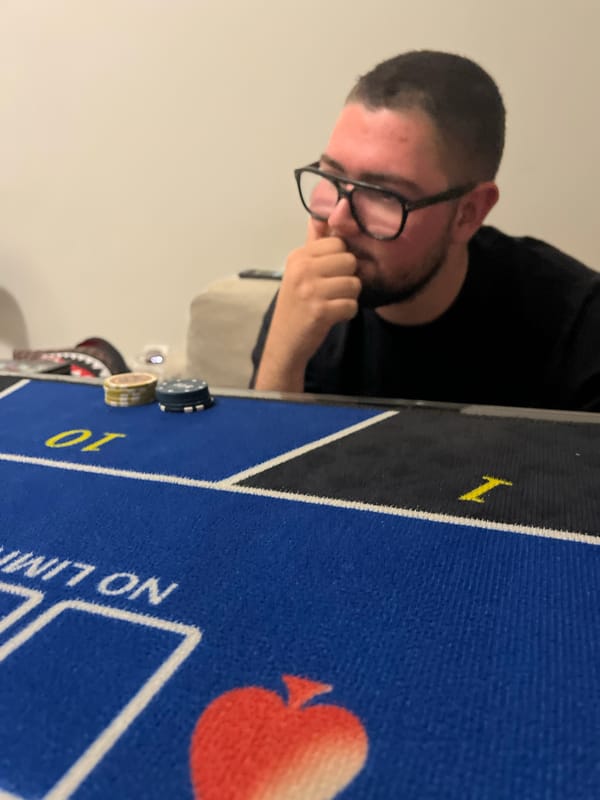 Man contemplates poker decision in Burgas, Bulgaria