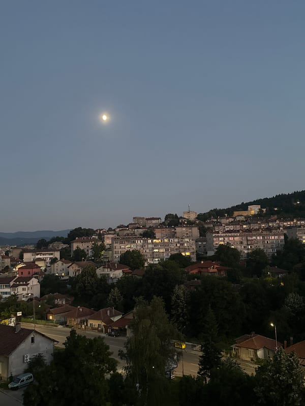 Full moon rises over Gabrovo at dusk