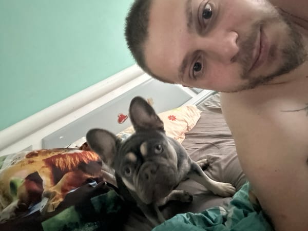 Man and dog share quiet morning moments at home