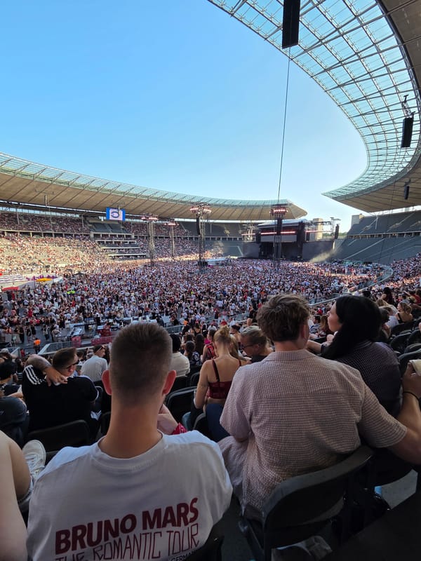 Sunny stadium crowd at a Just Dance event