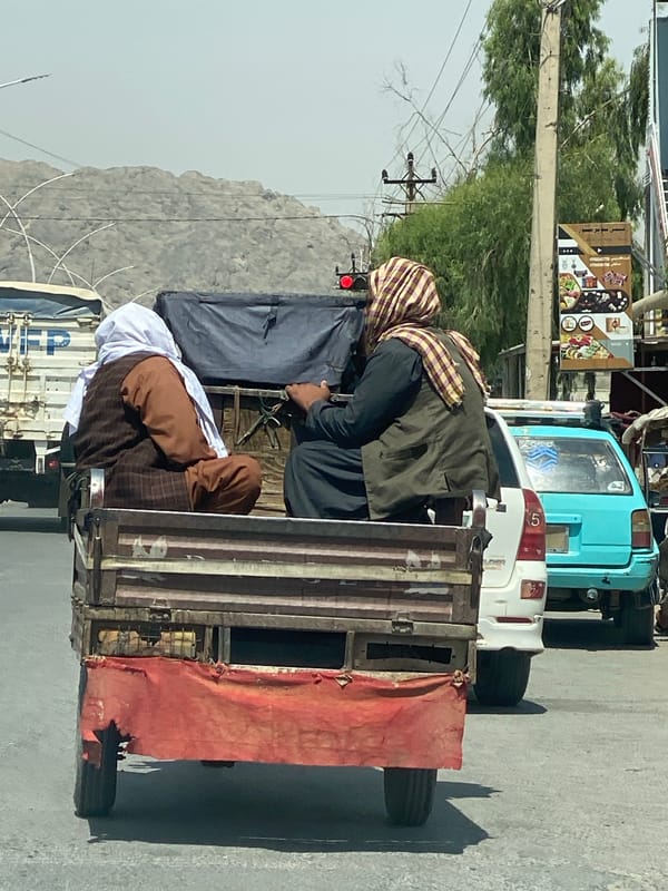 Everyday street life and construction activity in Kandahar
