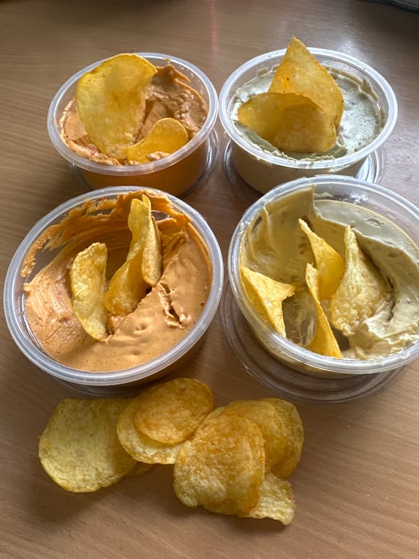 Afternoon snack spread documented in Riga featuring dips and chips