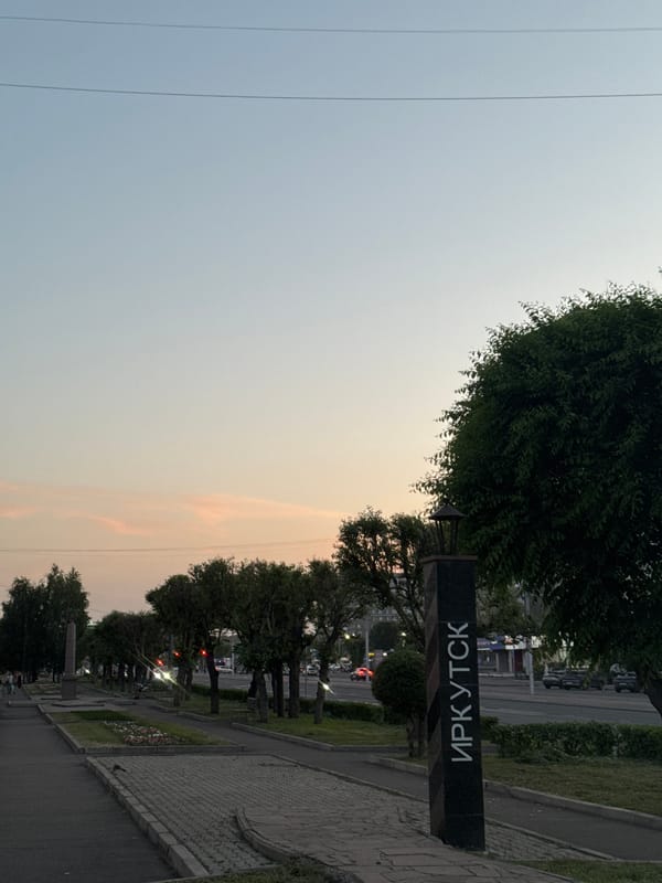 Krasnoyarsk streets: walkways, construction, and a landmark sign