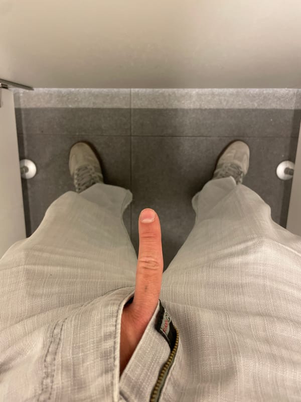 Indoor documentation captures bathroom scenes and empty convention space