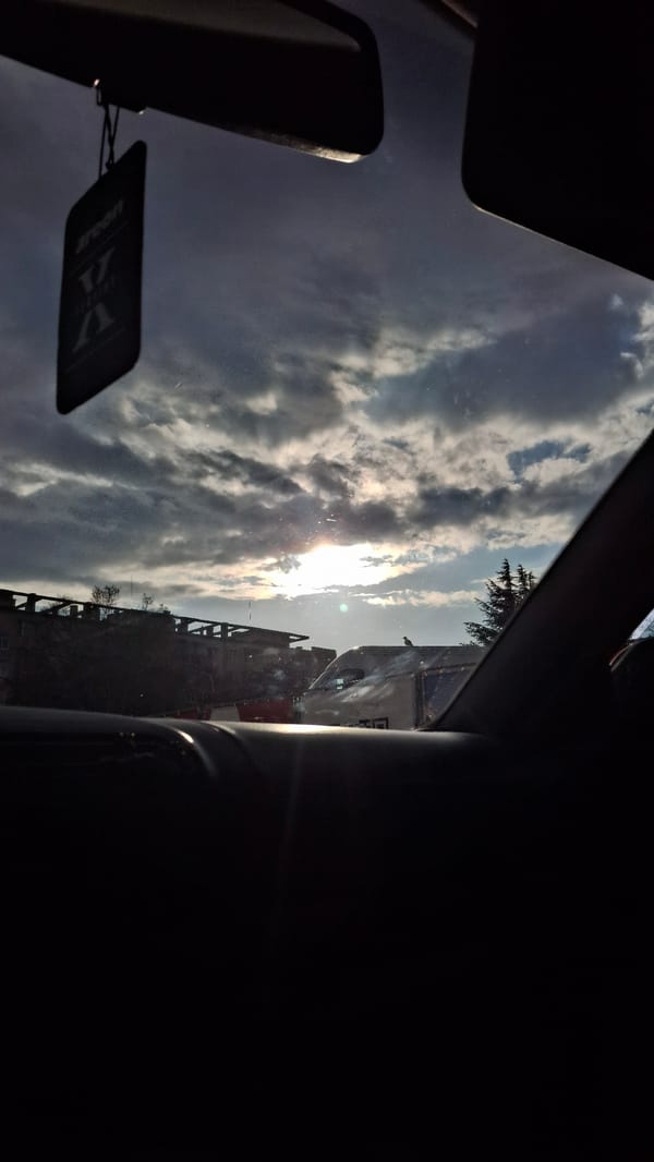 Vehicle occupant observes sky through windshield on April 12