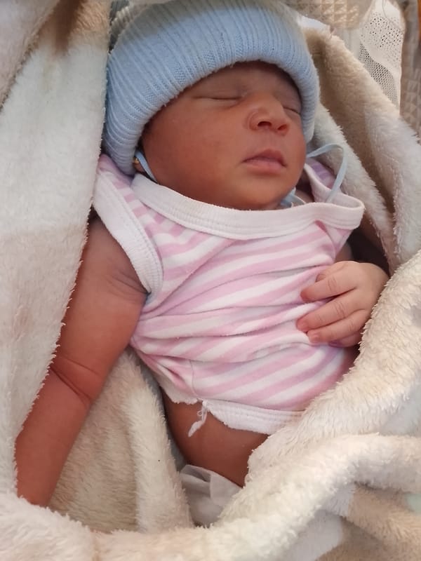 Newborn sleeps peacefully in Yelwa, Nigeria