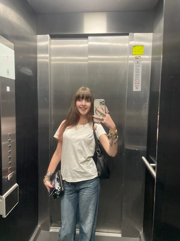 Woman takes selfie in Raanana elevator Tuesday morning