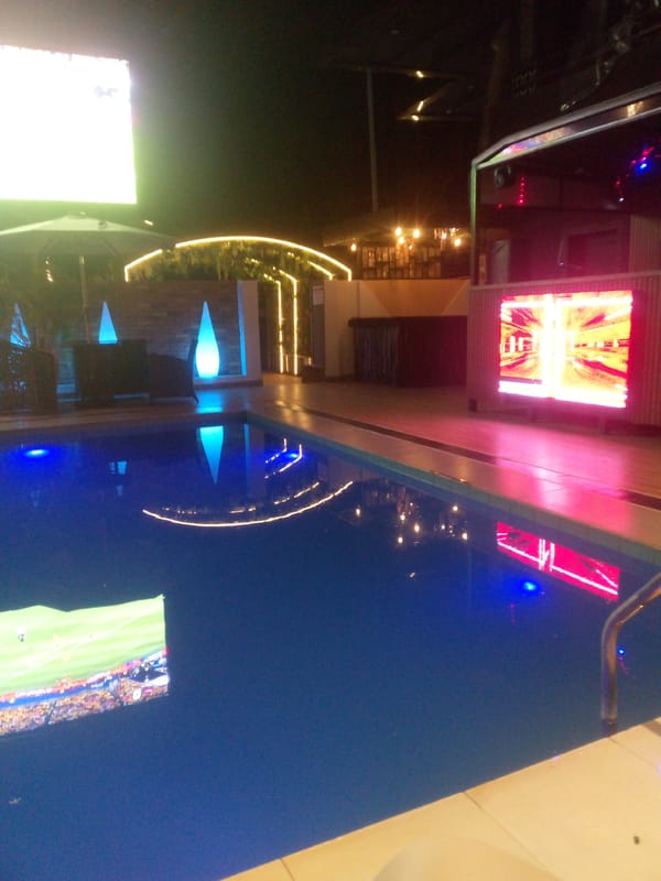 Evening at upscale pool venue in Gura Top