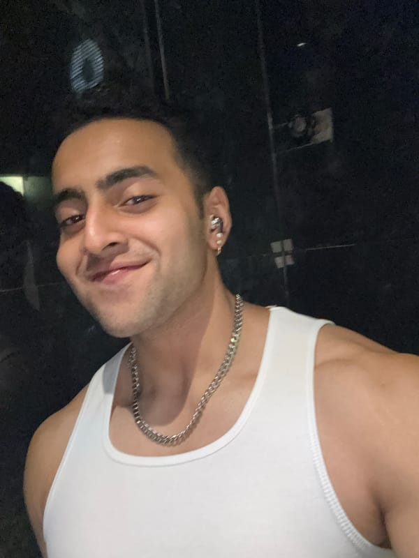 Man photographed smiling indoors in Kolkata