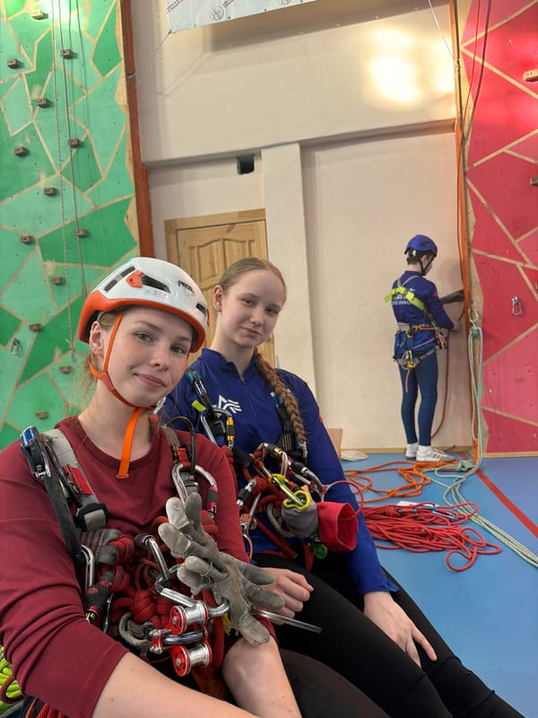 Indoor climbing training session documented in Berezniki facility