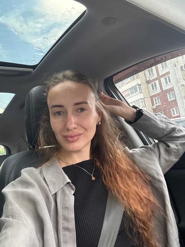 Selfie session inside a parked Kia in Krasnoyarsk