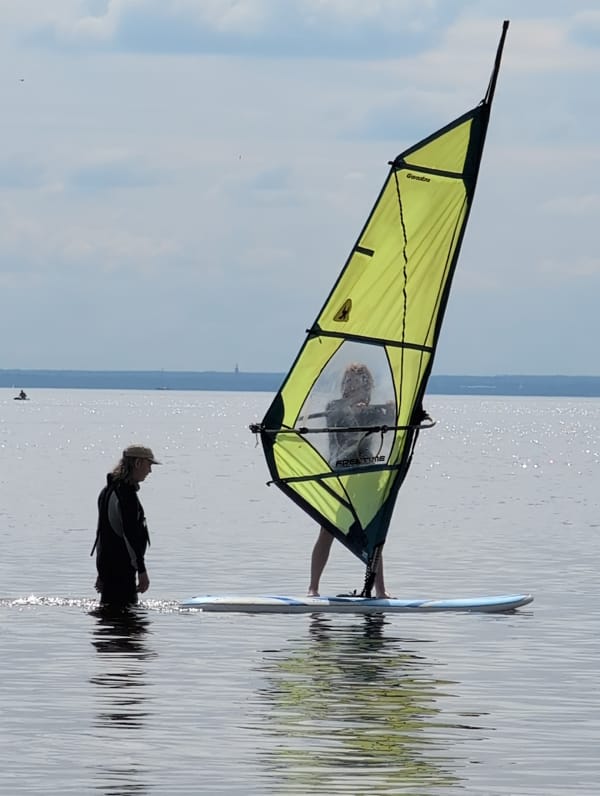 Windsurfing session on calm Saint Petersburg waters