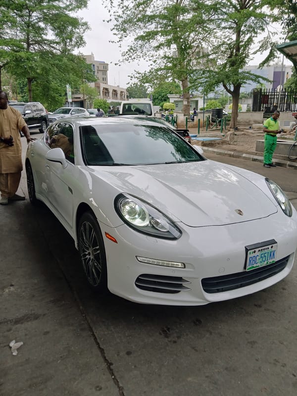 Man in traditional dress spotted with luxury car in Abuja
