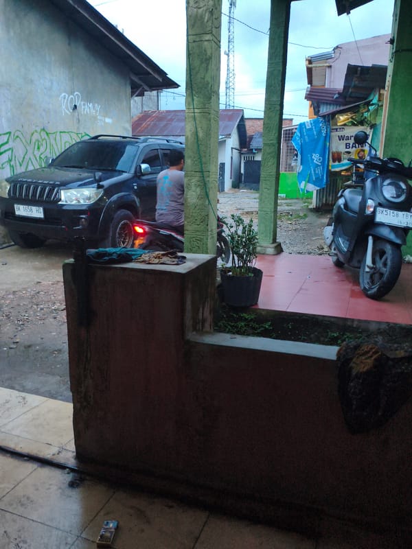 Toyota SUV parked on residential street in Rantauprapat