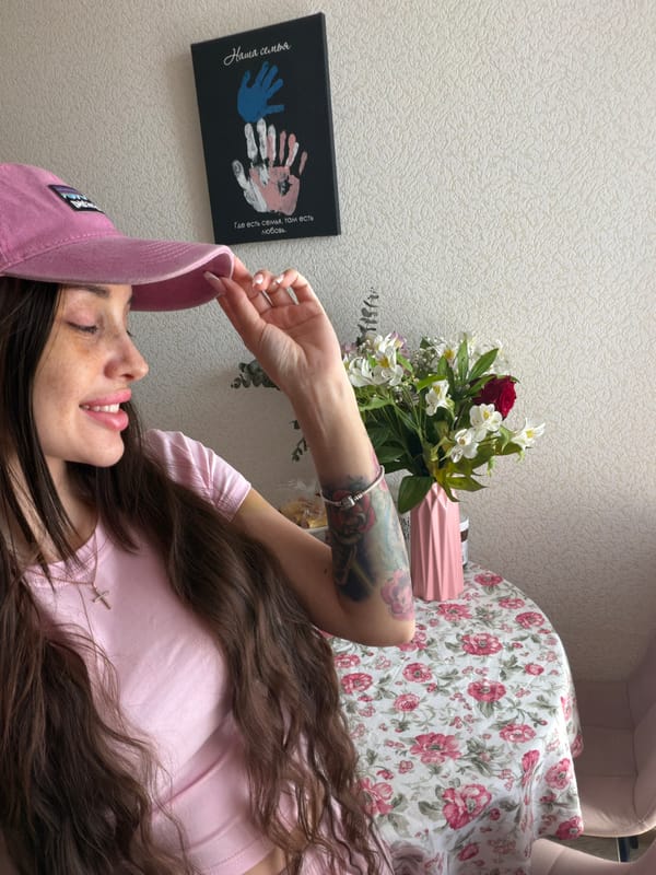 Woman takes mirror selfies in pink outfit, Saint Petersburg