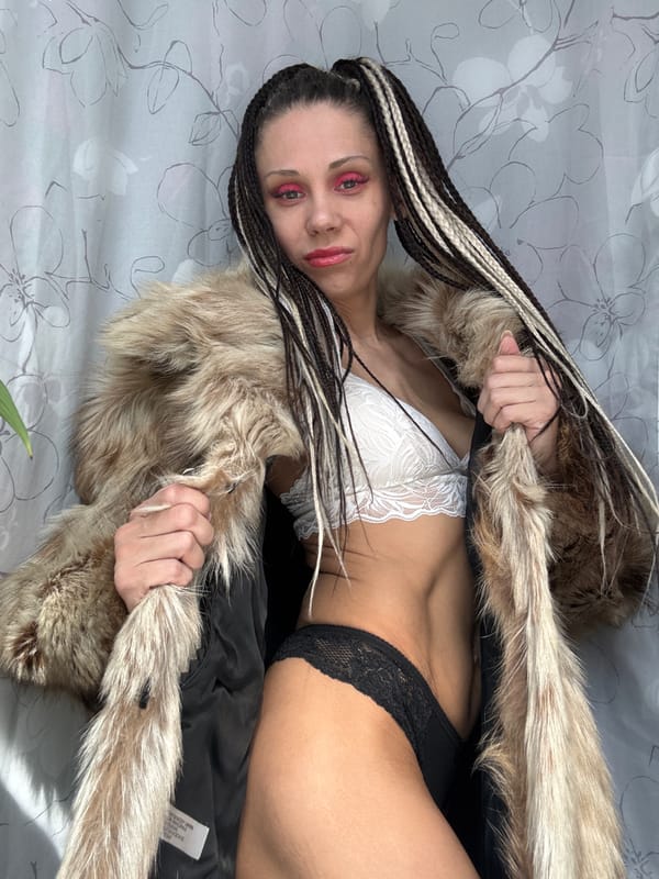 Photo session documented in Rusanovo featuring woman with braided hair