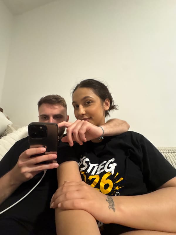Couple takes casual selfies on couch in Mönchengladbach