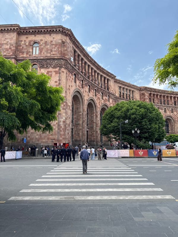 Military parade with officials proceeds through central Yerevan