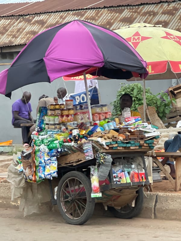 Street vendors conduct business in Jos, Nigeria