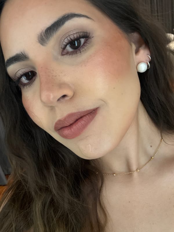 Woman takes selfies with polka-dot phone in Mexico home