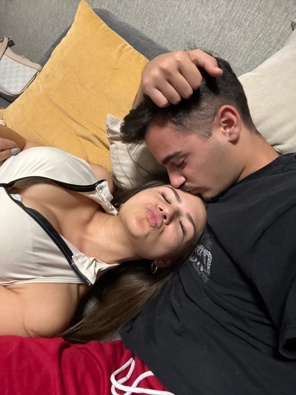 Couple shares intimate moment on couch in Sofia