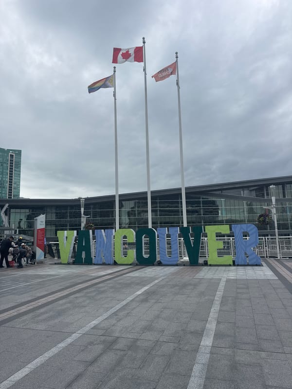 Canada Place waterfront buzzing on a cloudy Vancouver afternoon