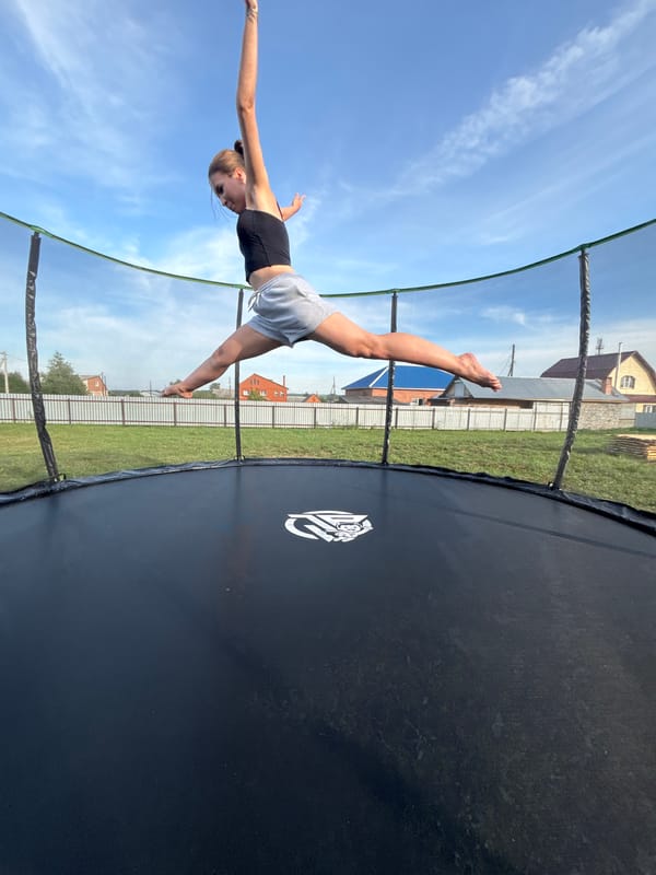 Backyard trampoline session in Vishnevka, Russia