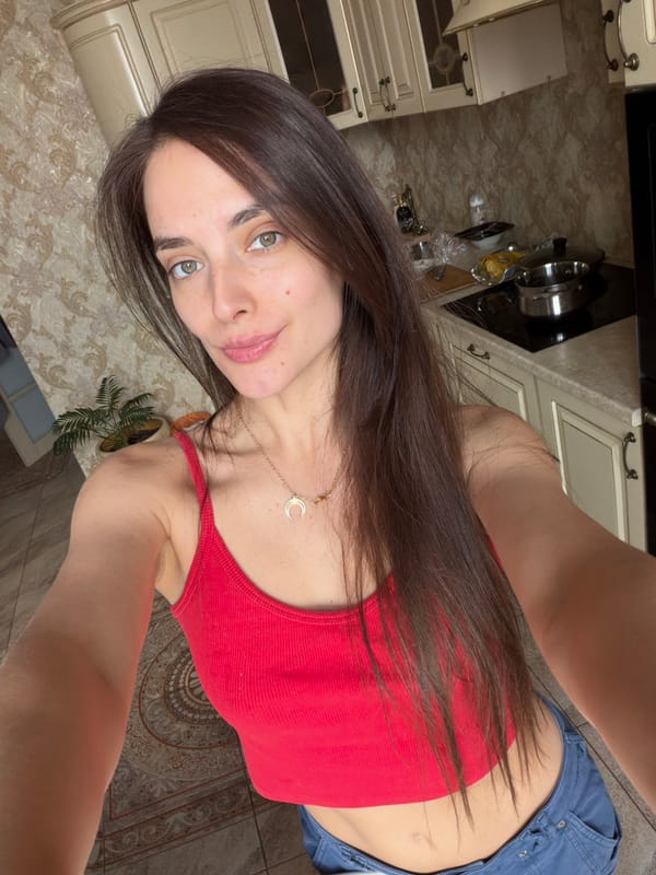 Home selfie session in Ufa with a red rose