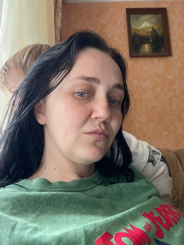 Nine selfies on a recliner, green Tom and Jerry tee throughout