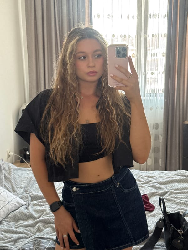 Woman takes selfie in Plovdiv room
