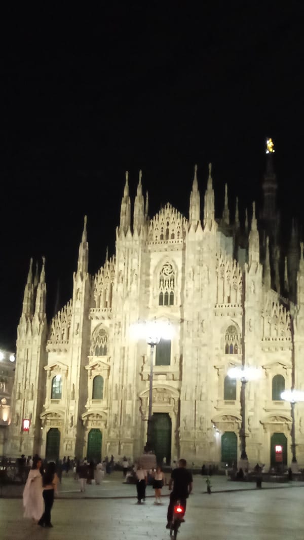 Milan's Duomo district buzzing on a summer night