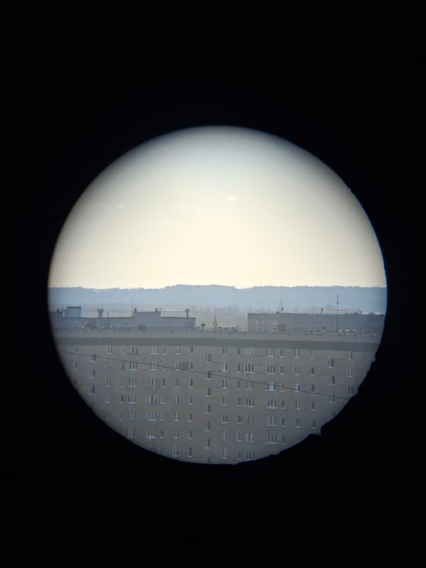 Observer uses optical equipment to view landscape in Sarapul