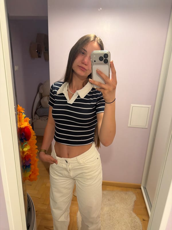 Woman takes selfies, receives roses in Buhovo evening scene