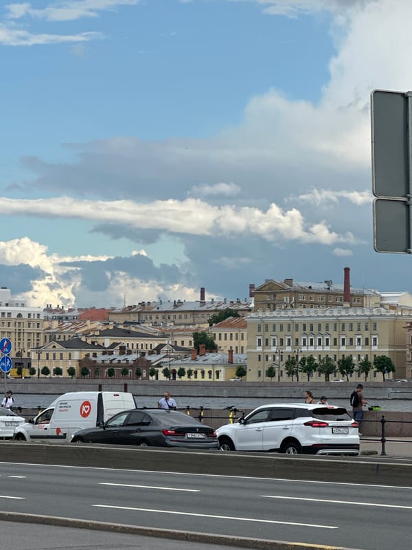 Saint Petersburg cityscape with waterfront and road on cloudy day