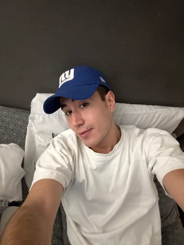 Person resting with snacks in Mexican bedroom early morning